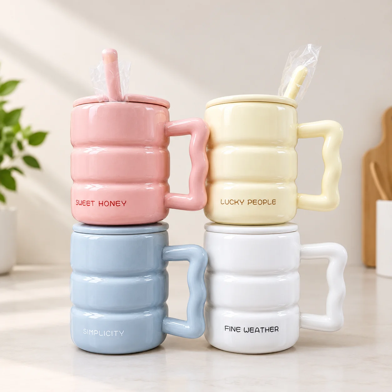 Pastel ceramic mugs with lids and matching spoons